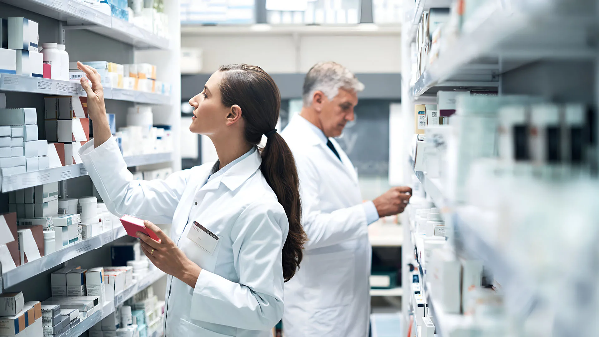 Toto2 0000s 0006 cropped shot two pharmacists checking products while working together dispensary